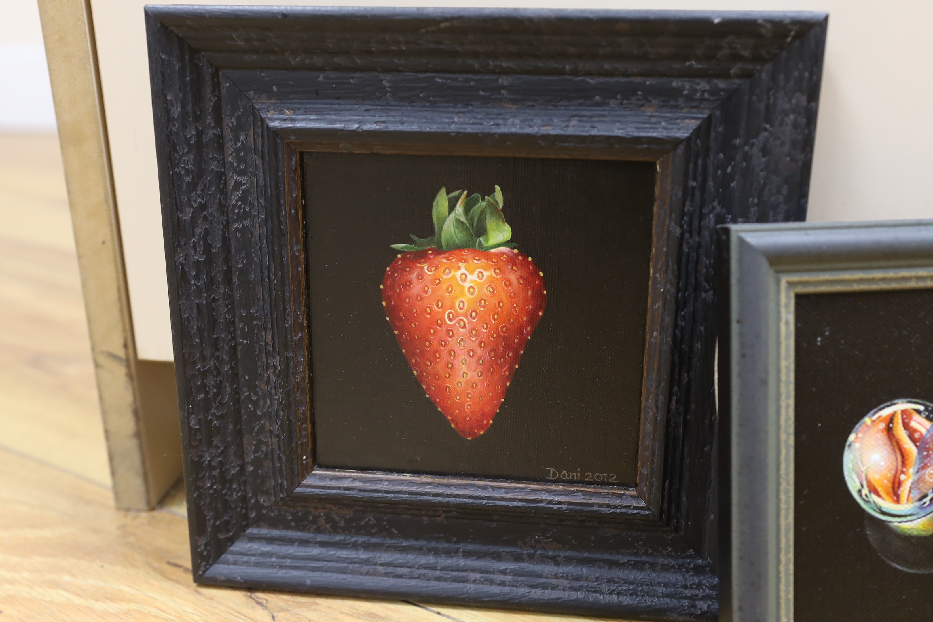Dani Humberstone (contemporary) three oils on canvas board, Still lifes, 'Big red strawberry', 'Marbles No1' and 'Marbles No2', each signed and dated, largest 12 x 11cm